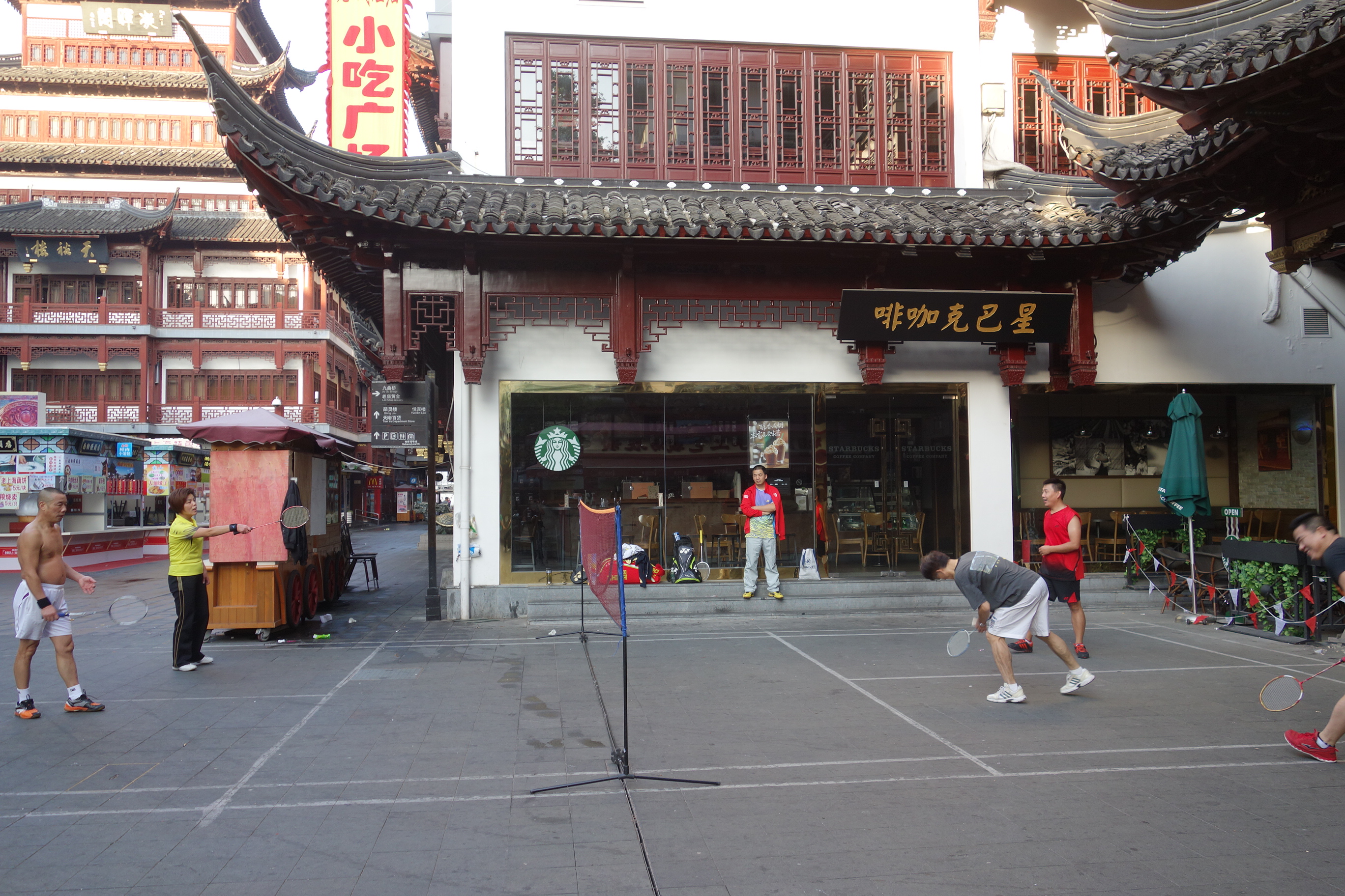 One of my favorite sites from Shanghai: badminton in front of Starbucks