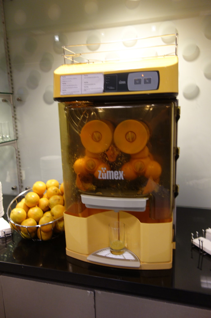 Orange juice machine with oranges!