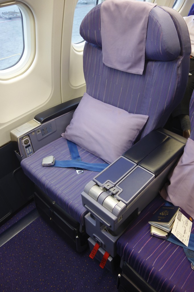 Recliner-style business class seat