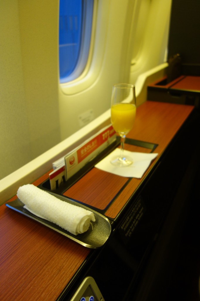 Hot towel and pre-departure beverage