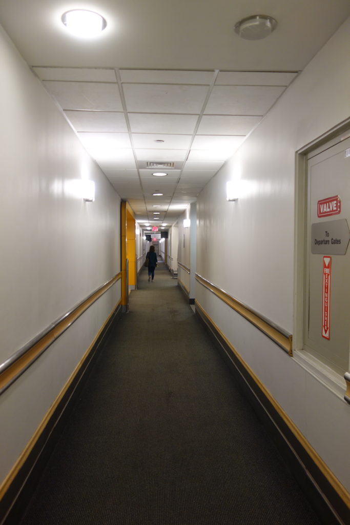a person walking down a hallway