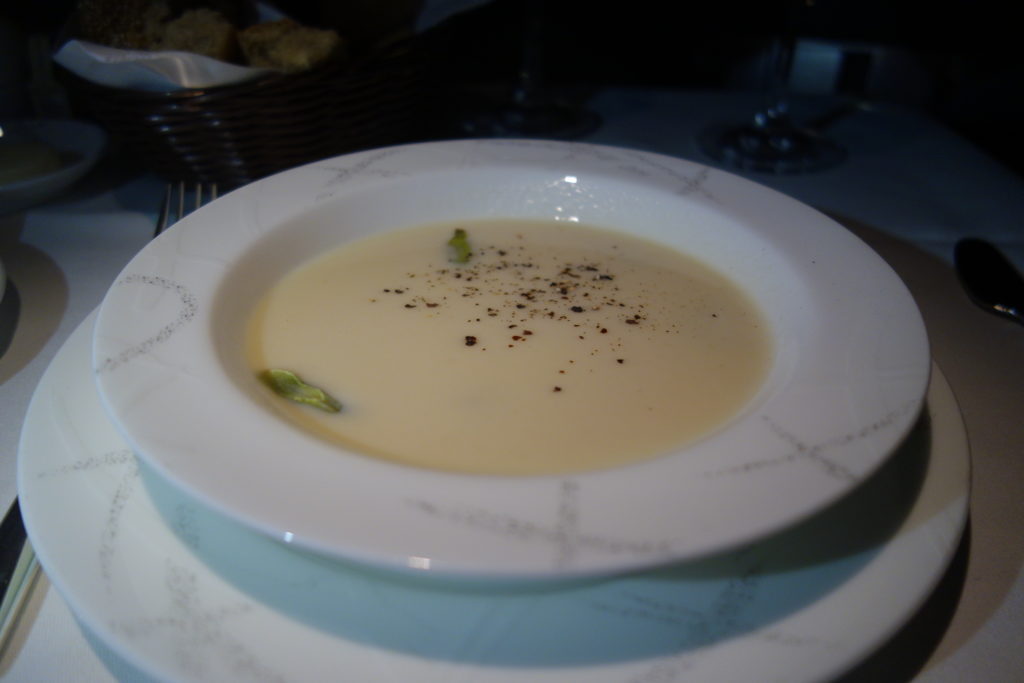 a bowl of soup on a plate