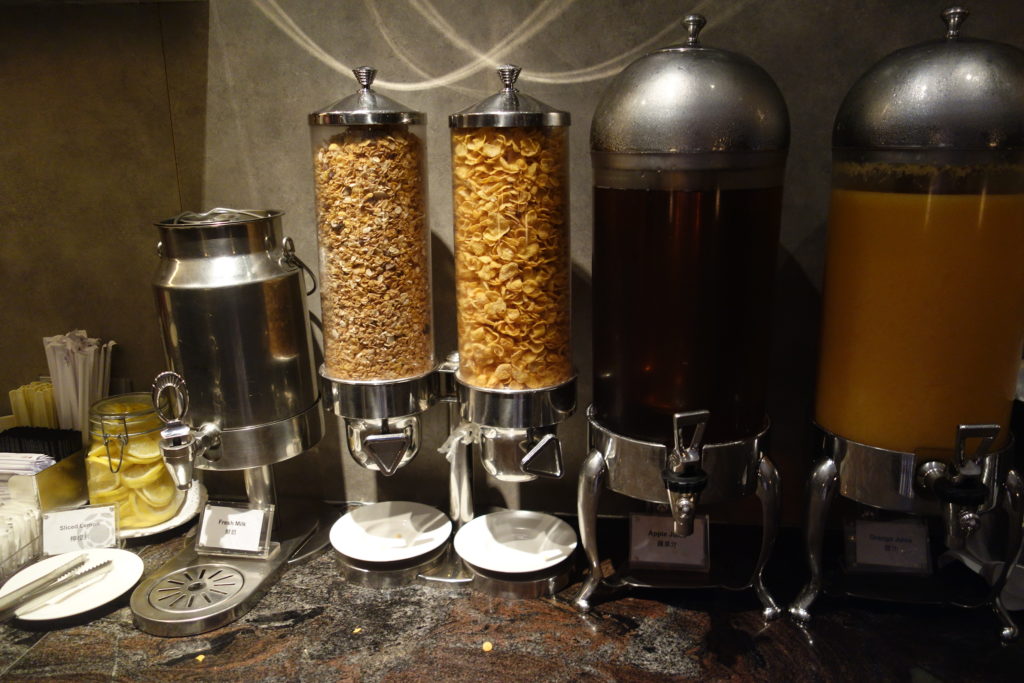 a group of cereals and a drink dispenser