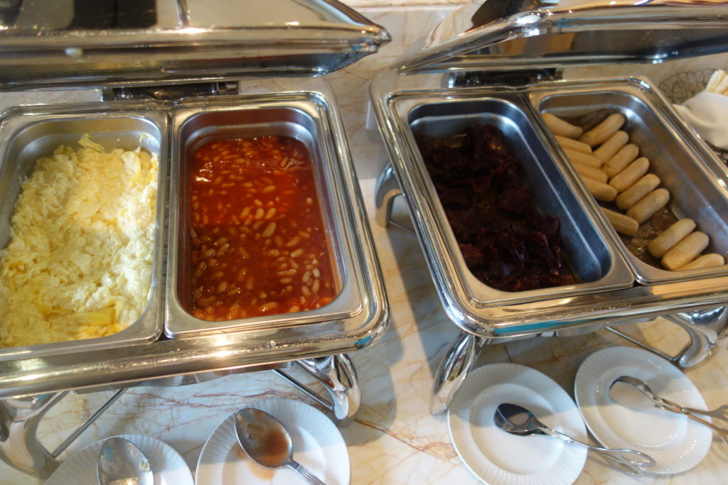 a buffet with food in containers