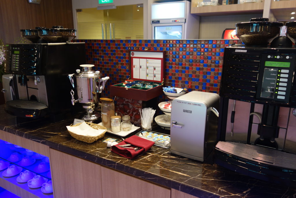 a coffee machine and other items on a counter