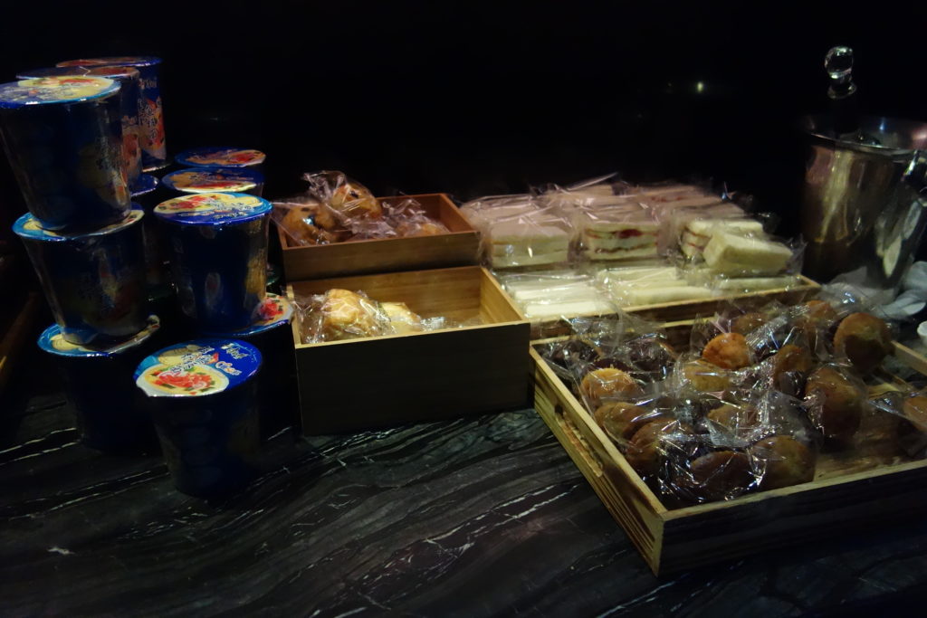 a table with food in boxes