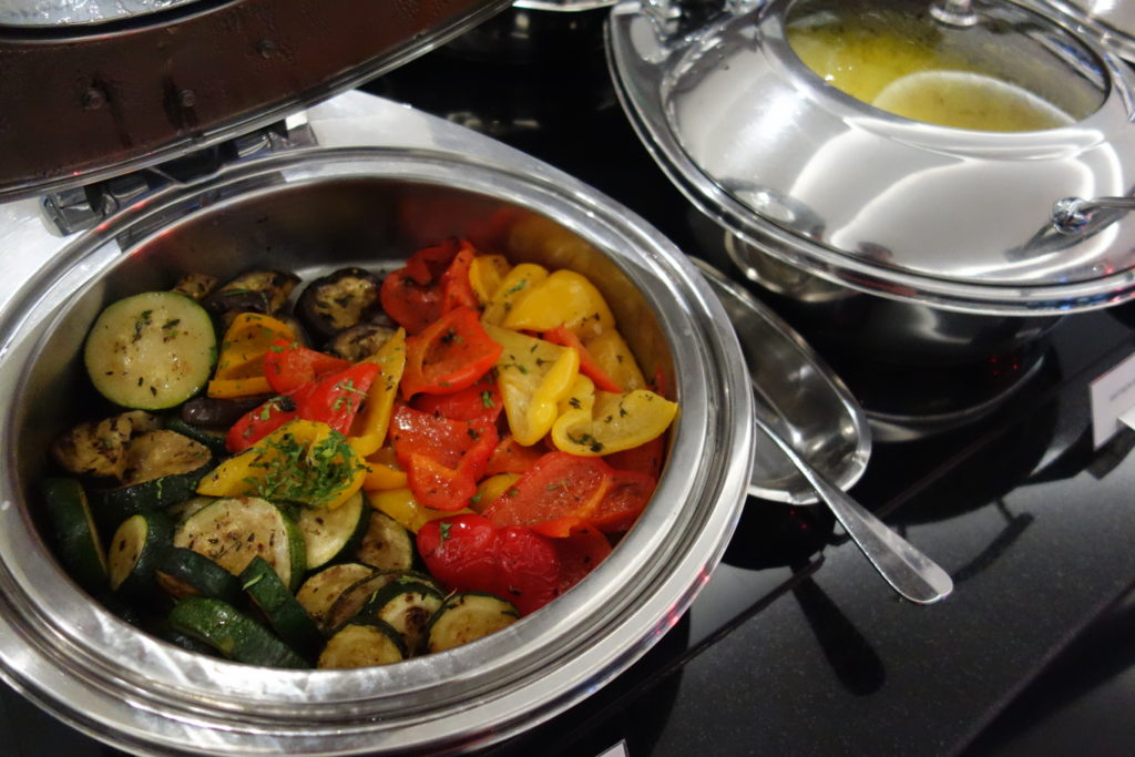 a bowl of vegetables on a stove