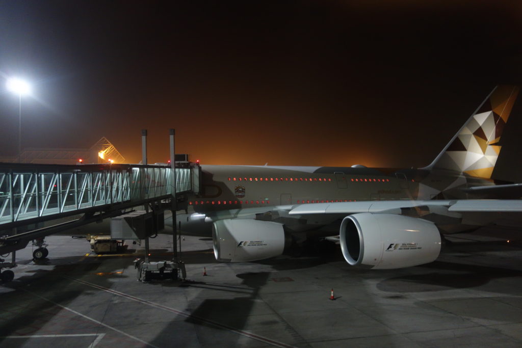 a plane on the tarmac at night