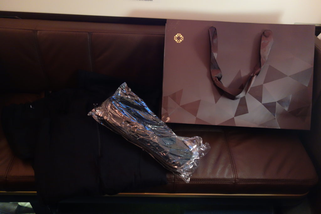 a bag and a bag on a couch