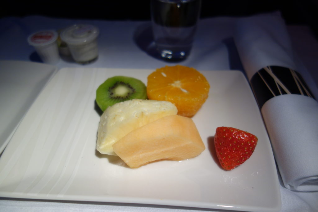 a plate of fruit on a table