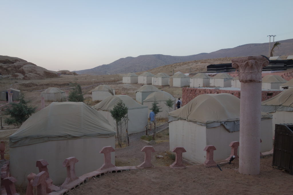 a group of tents in a desert