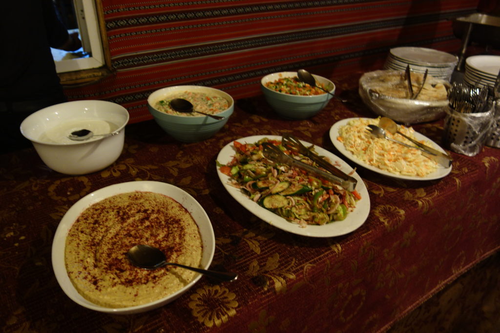 a table with bowls of food