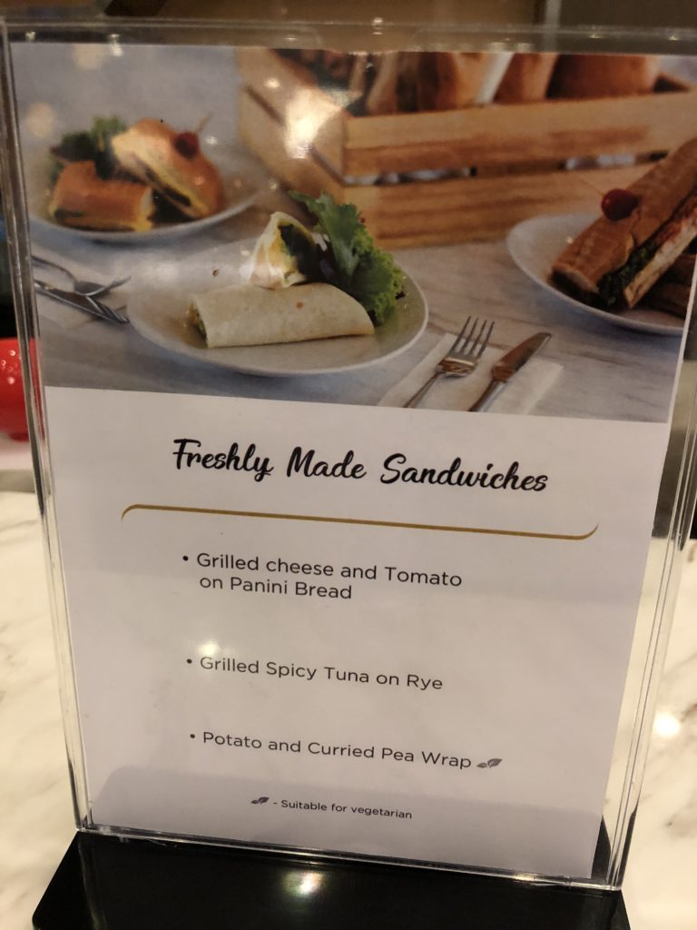 a menu of sandwiches on a table