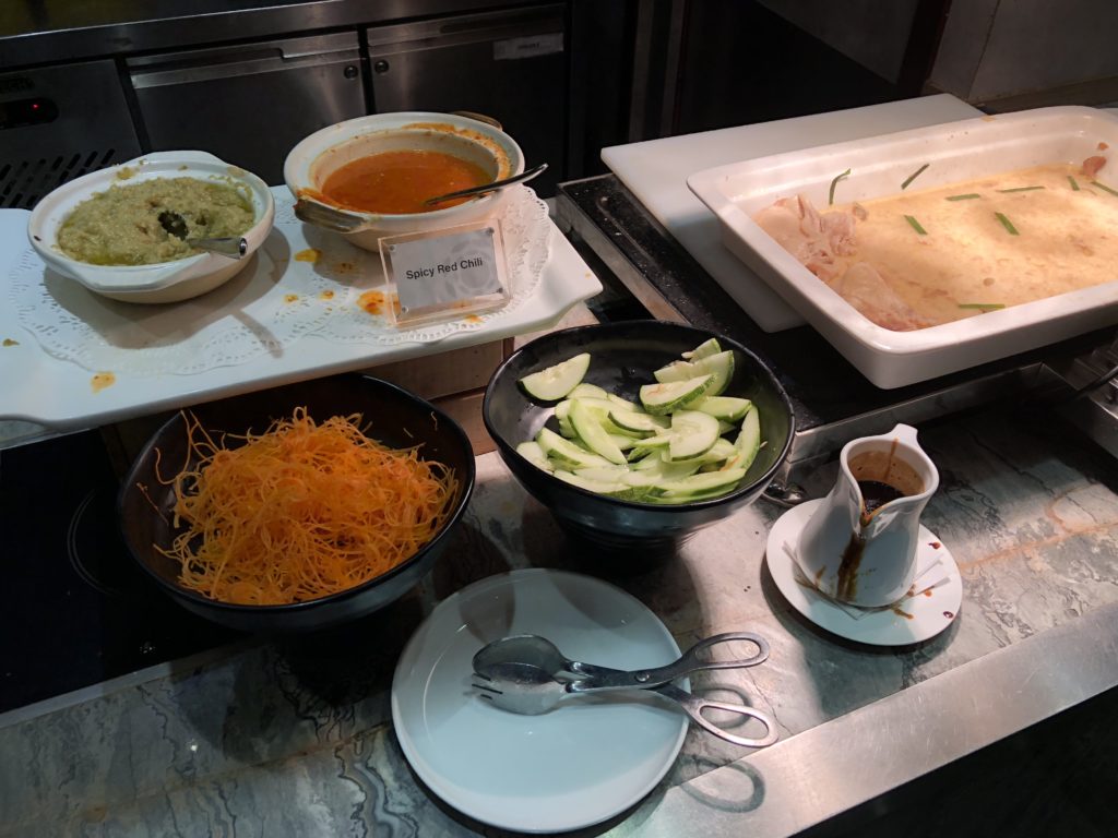 a buffet table with different food items