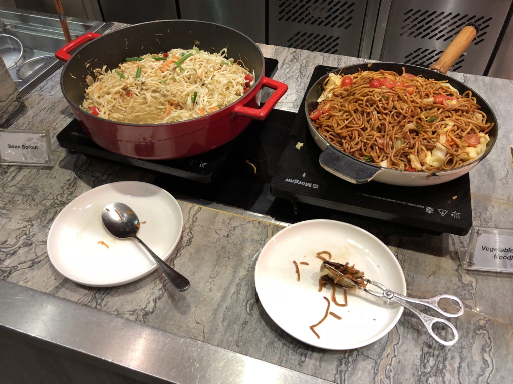 a pans of food on a stove