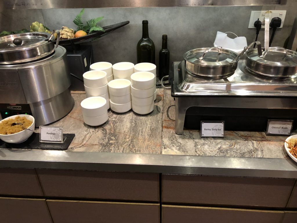a kitchen counter with pots and pans