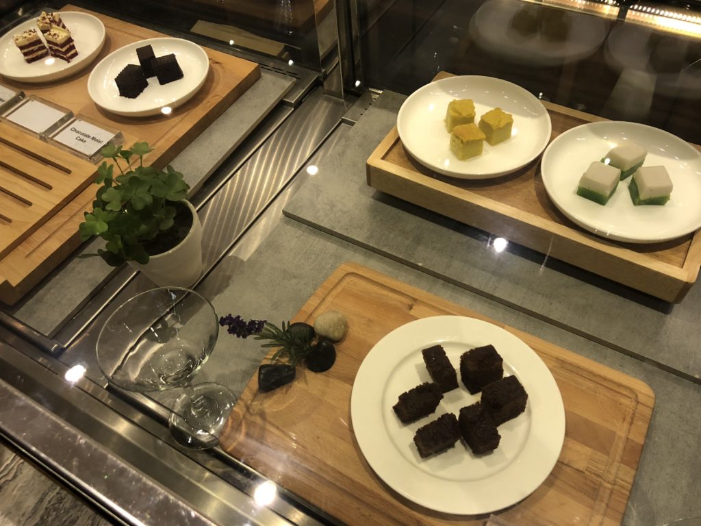 a group of plates of desserts on a table